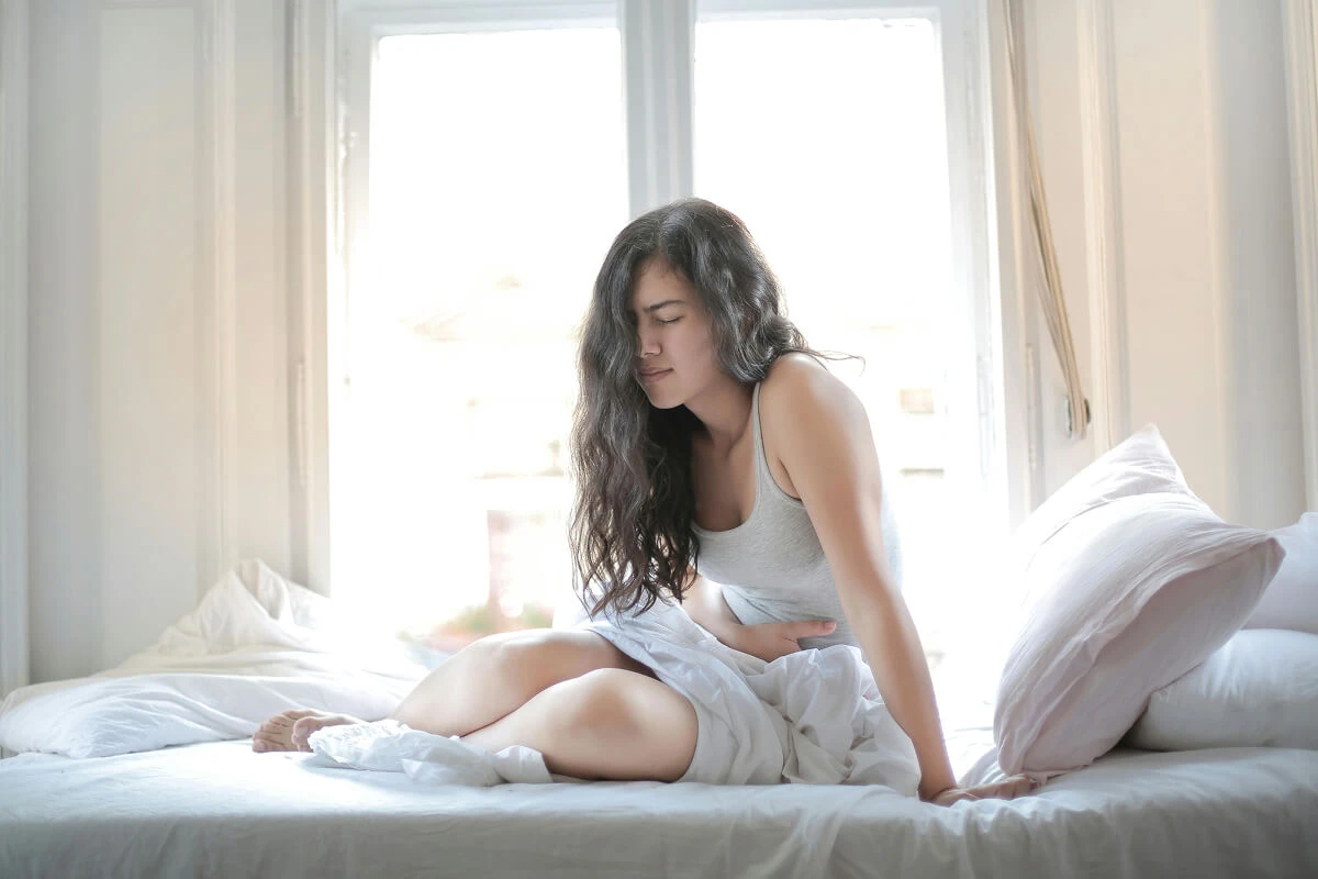 Pregnant woman relaxing at home